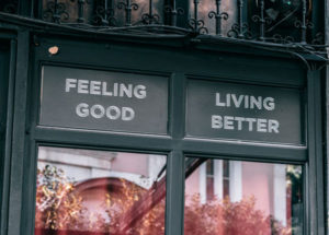 Improve your health - store windows with the words Feeling Good - Living Better